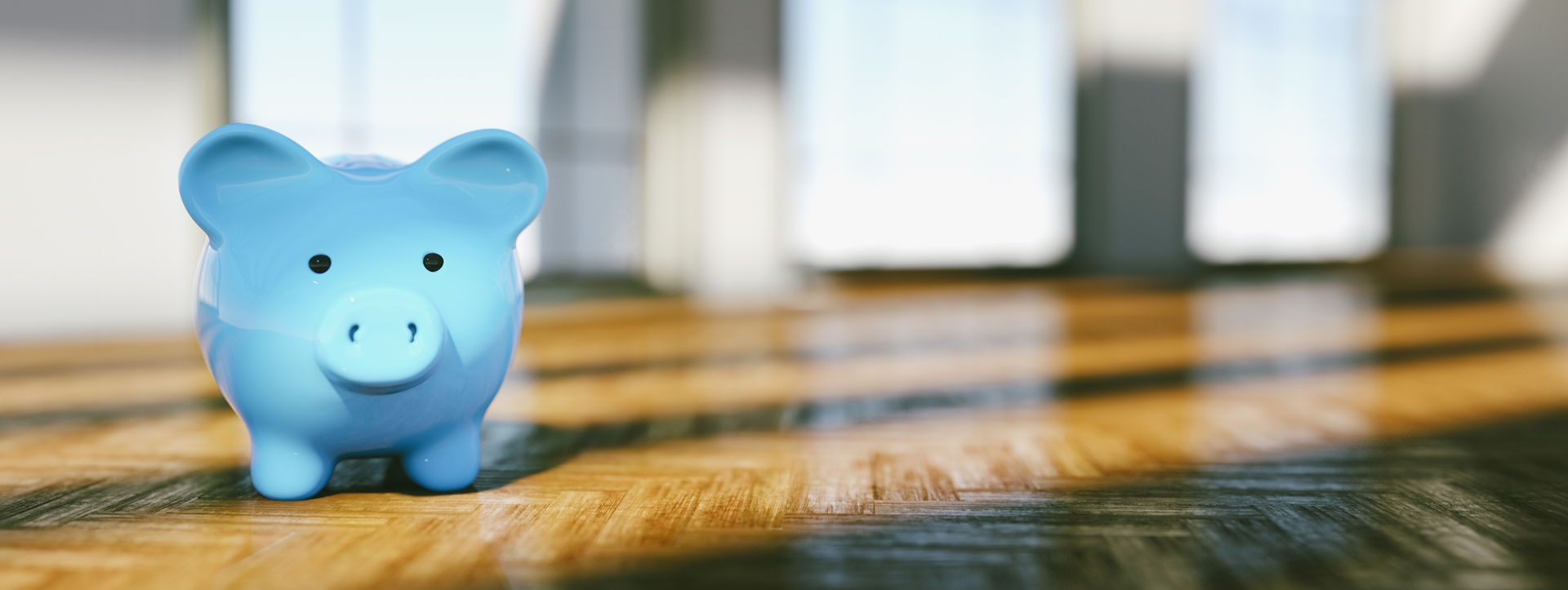 blue piggy bank on a table